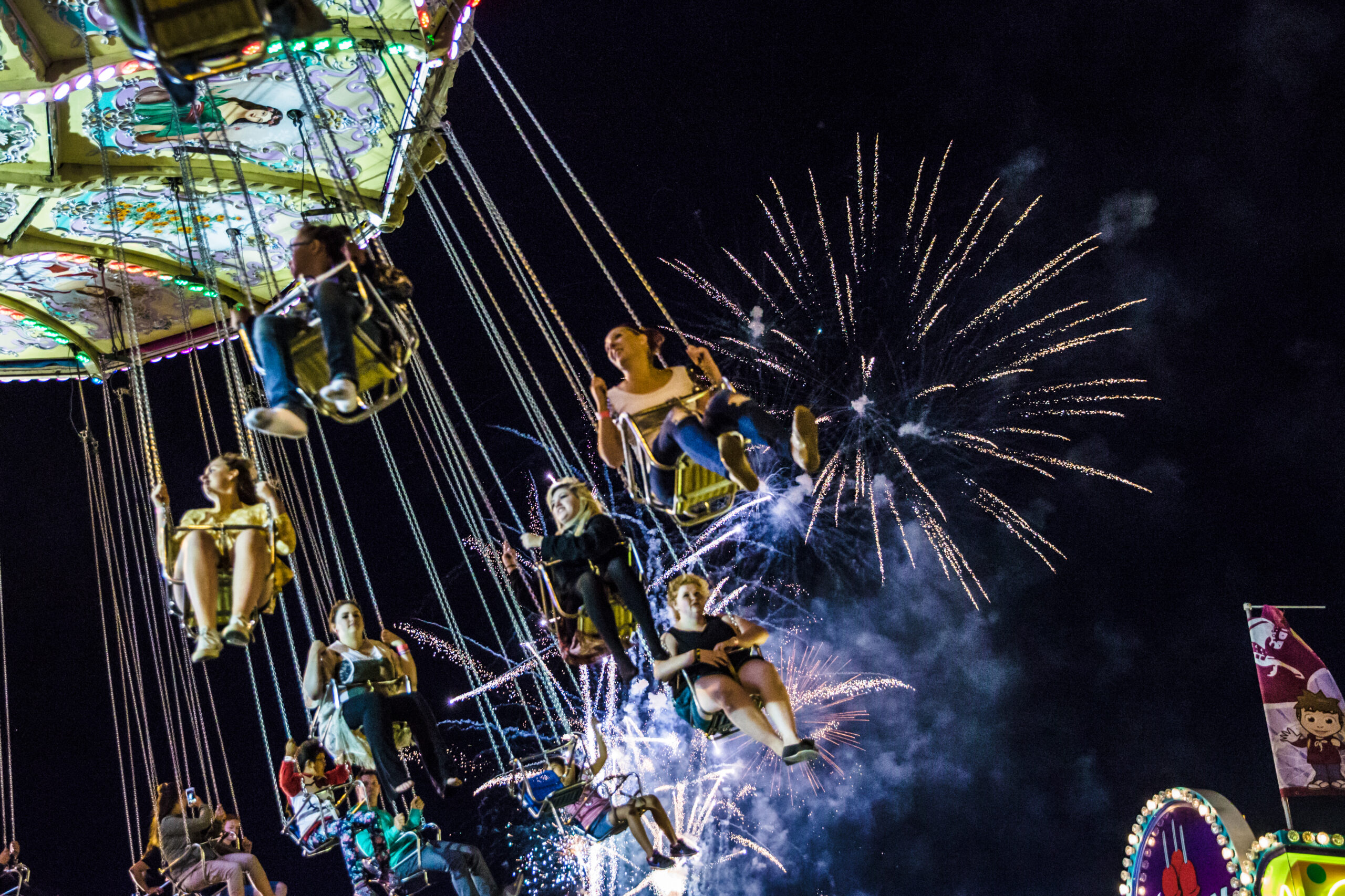 K-Days_People on a ride during fireworks
